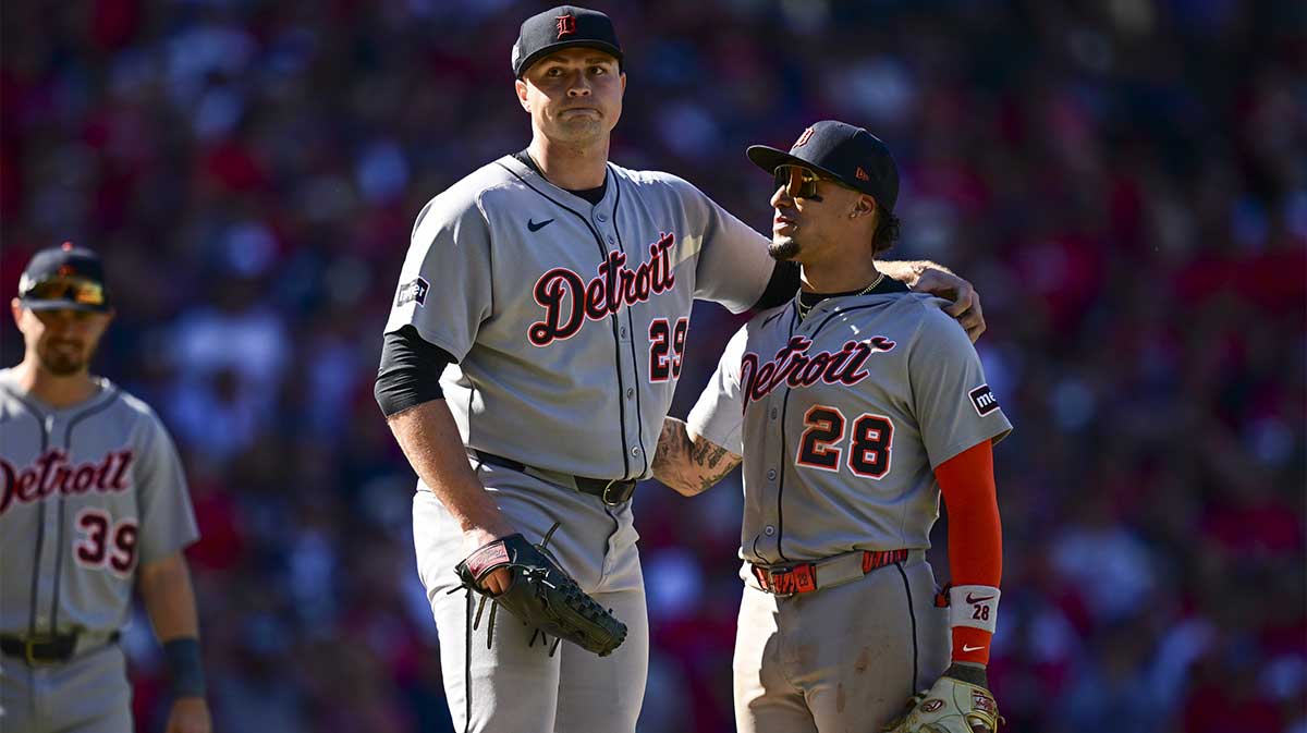 Detroit Tigers pitcher Tarik Skubal (29) is congratulated by outfielder Javier Báez (28) before being relieved against the Cleveland Guardians in the eighth inning during game one of the Wildcard round for the 2025 MLB playoffs at Progressive Field.
