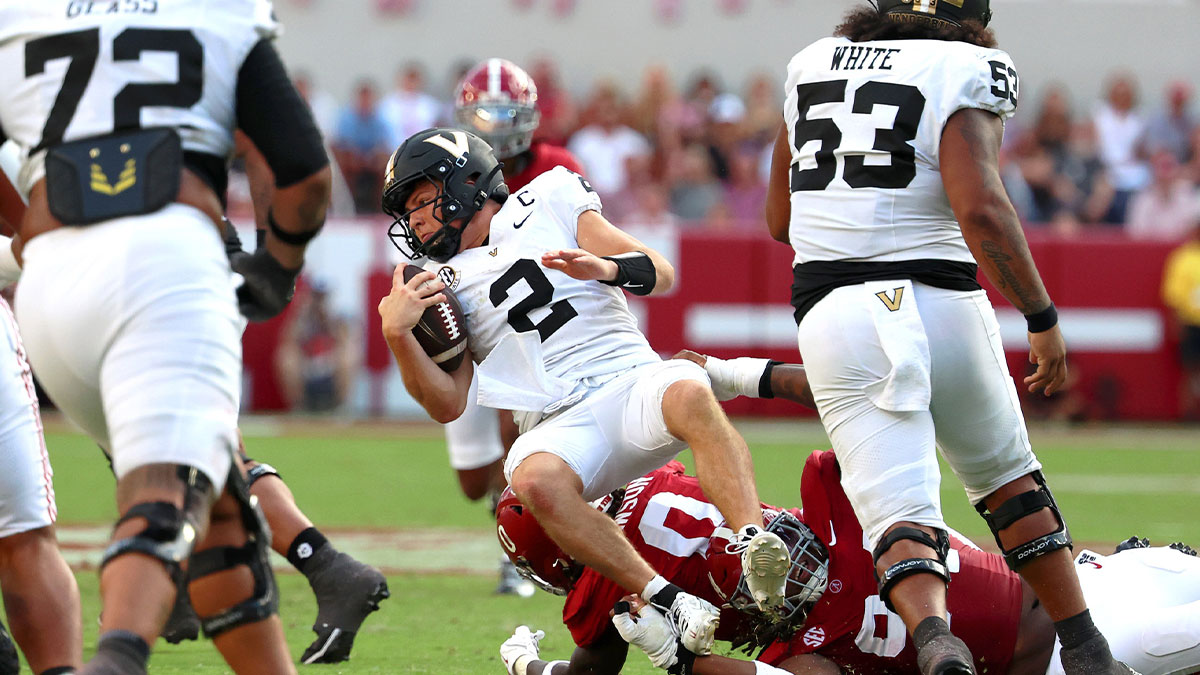 Vanderbilt Commodores quarterback Diego Pavia (2) is tackled during the second half against the Alabama Crimson Tide at Saban Field at Bryant-Denny Stadium.