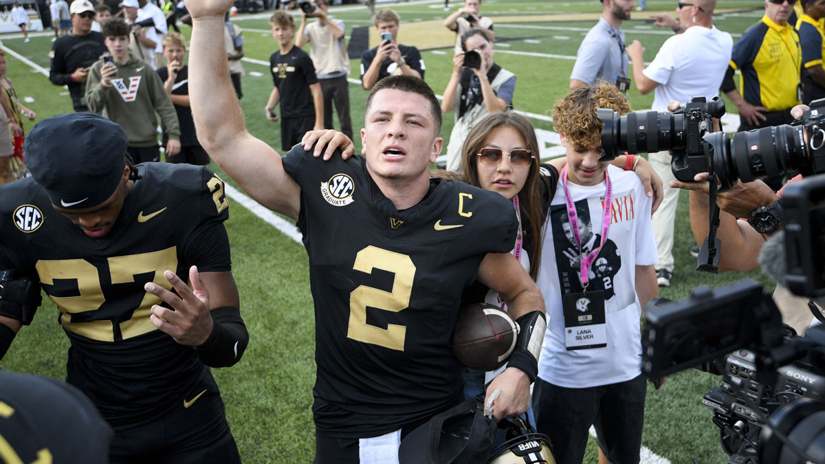 Vanderbilt Commodores quarterback Diego Pavia (2) celebrates the win with the student section against the Louisiana State Tigers during the second half at FirstBank Stadium.