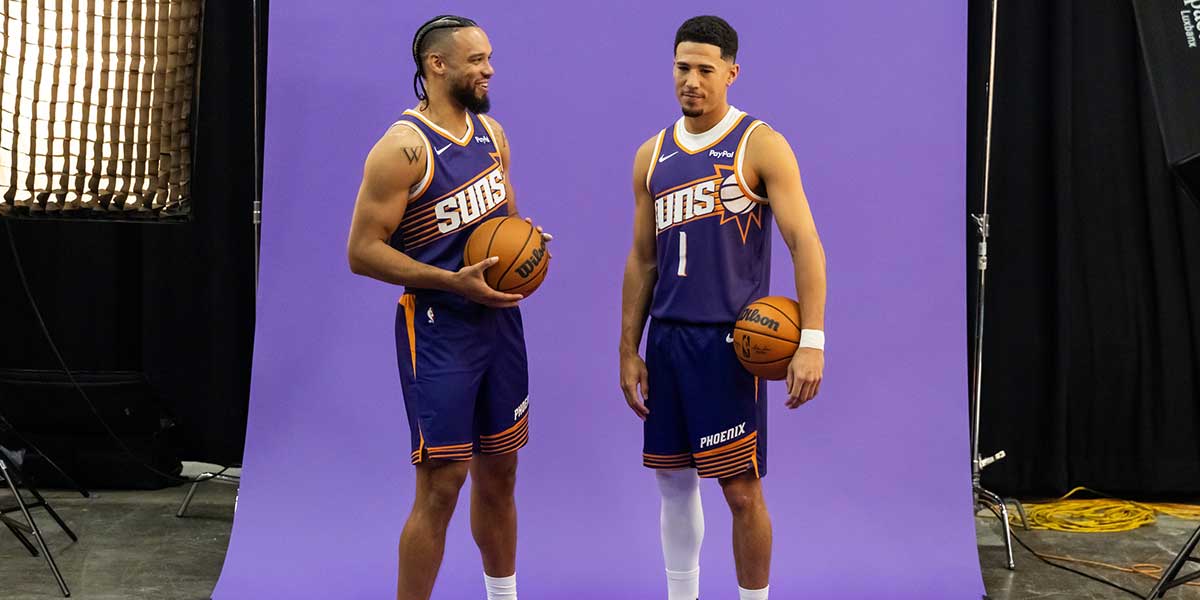 Phoenix Suns forward Dillon Brooks (3) and guard Devin Booker (1) pose for portrait during Media Day at PHX Arena.