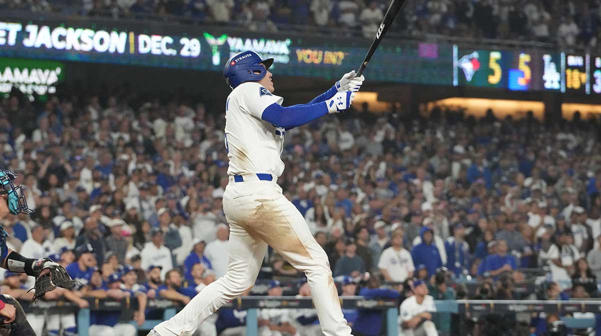 Los Angeles Dodgers first baseman Freddie Freeman (5) hits a walk off home run in the eighteenth inning against the Toronto Blue Jays during game three of the 2025 MLB World Series at Dodger Stadium.