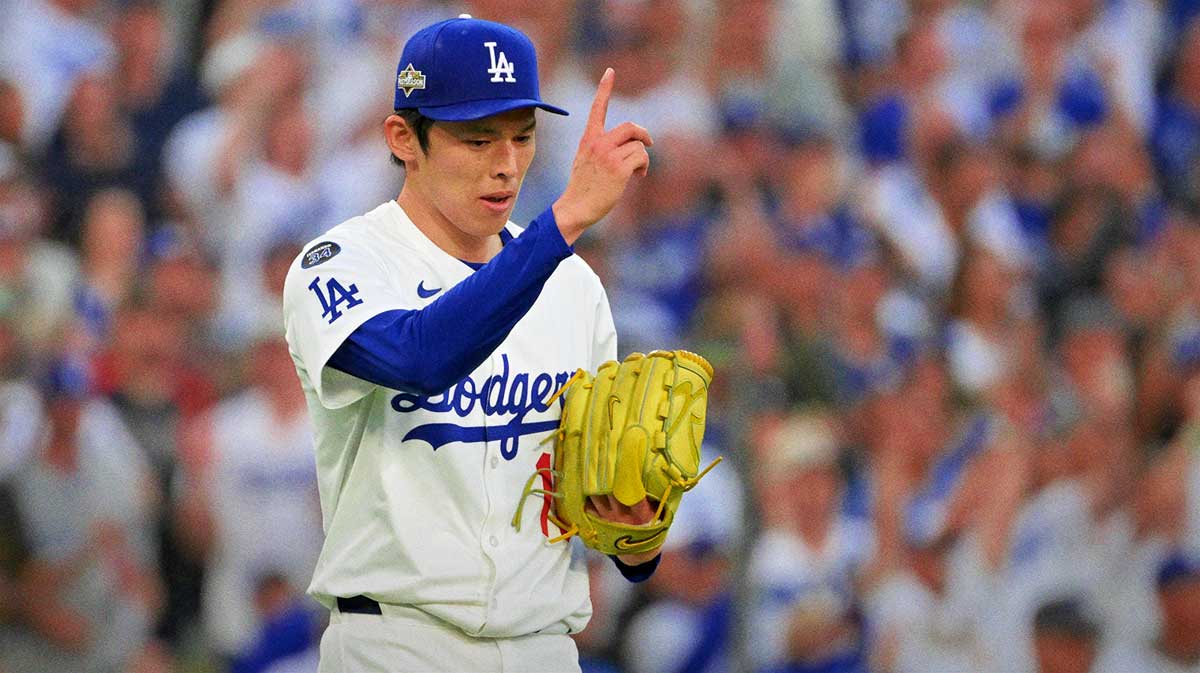 Los Angeles Dodgers pitcher Roki Sasaki (11) reacts after the tenth inning against the Philadelphia Phillies during game four of the NLDS round for the 2025 MLB playoffs at Dodger Stadium.