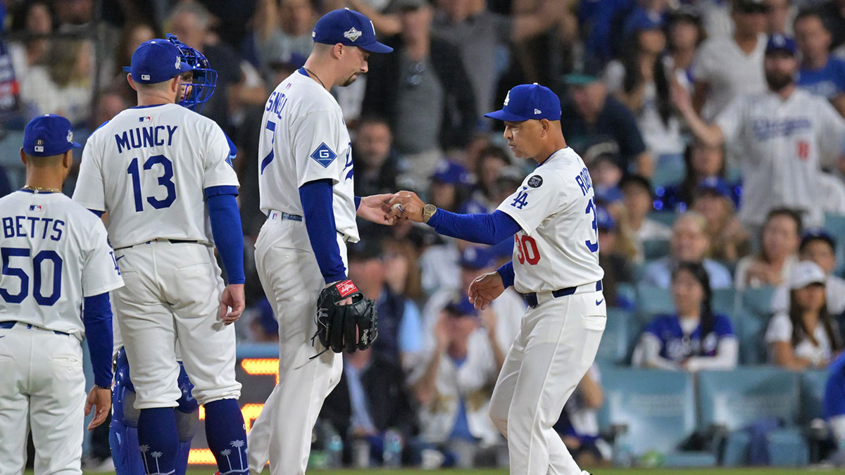 Los Angeles Dodgers manager Dave Roberts (30) relieves pitcher Blake Snell (7) in the seventh inning against the Toronto Blue Jays during game five of the 2025 MLB World Series at Dodger Stadium