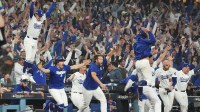 The Los Angeles Dodgers celebrate defeating the Toronto Blue Jays in the eighteenth inning during game three of the 2025 MLB World Series at Dodger Stadium.