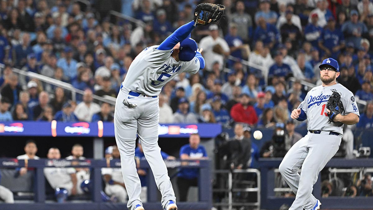 Los Angeles Dodgers first baseman Freddie Freeman (5) is unable to catch a ball hit by Toronto Blue Jays third baseman Ernie Clement (not pictured) in the second inning during game two of the 2025 MLB World Series at Rogers Centre.