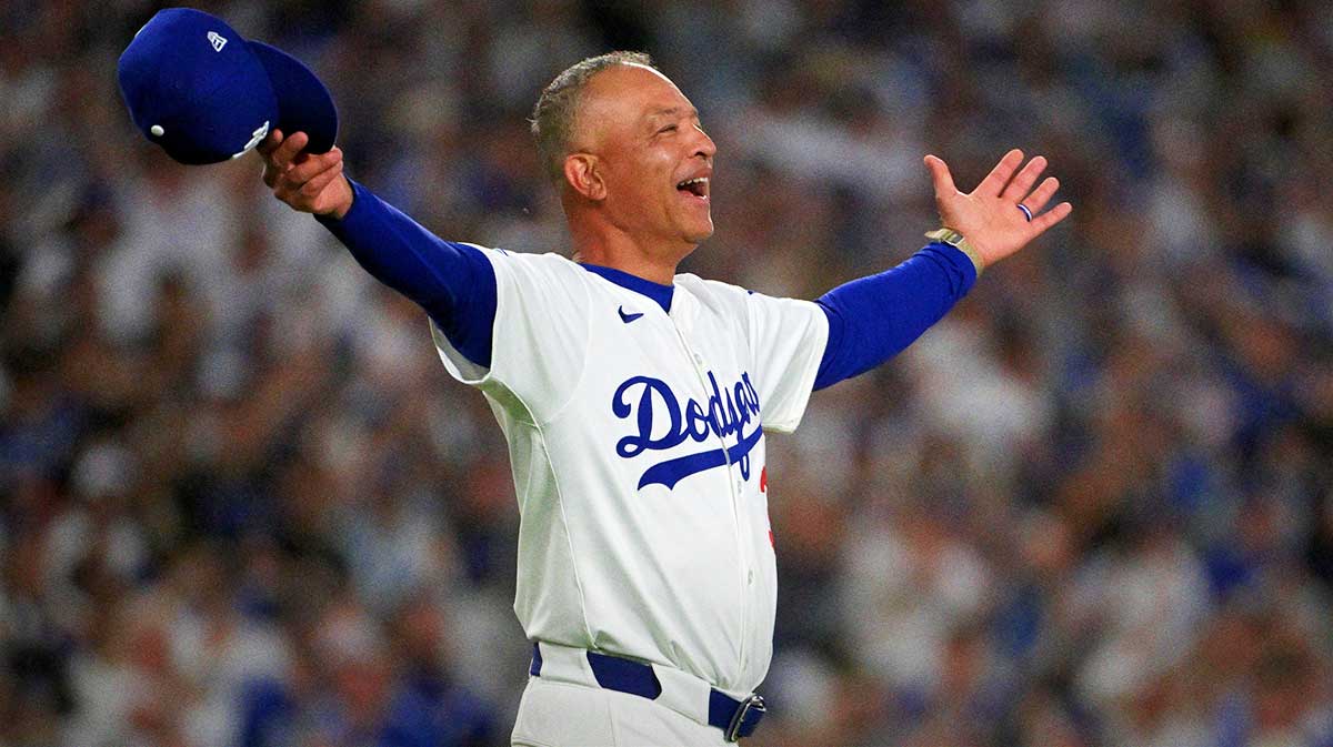 Los Angeles Dodgers manager Dave Roberts (30) celebrates after winning the NLDS round for the 2025 MLB playoffs against the Philadelphia Phillies at Dodger Stadium.