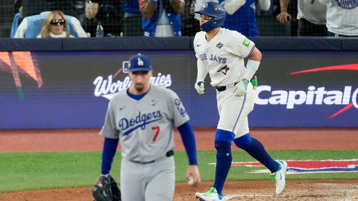 Los Angeles Dodgers pitcher Blake Snell (7) reacts as Toronto Blue Jays second baseman Bo Bichette (11) walks in the sixth inning during game one of the 2025 MLB World Series at Rogers Centre.