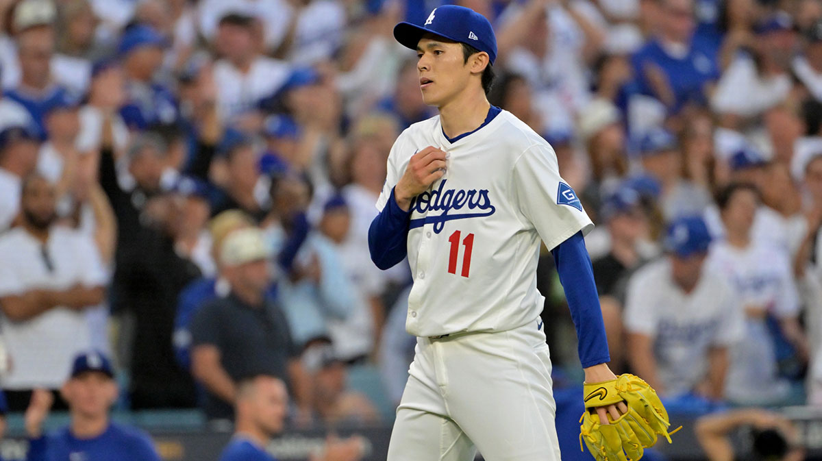 Los Angeles Dodgers pitcher Roki Sasaki (11) reacts after the tenth inning against the Philadelphia Phillies during game four of the NLDS round for the 2025 MLB playoffs at Dodger Stadium.