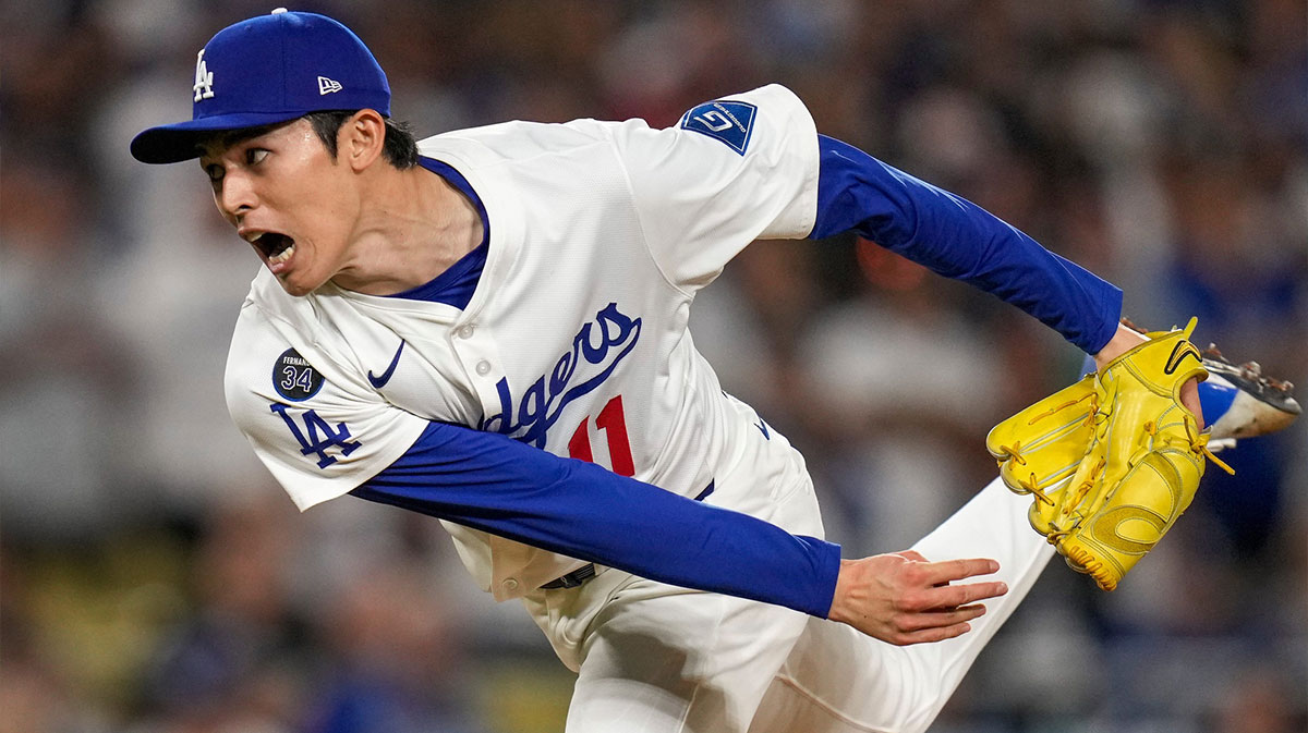 Los Angeles Dodgers pitcher Roki Sasaki (11) throws a pitch in the ninth inning of the MLB National League Wild Card Game 2 between the Los Angeles Dodgers and the Cincinnati Reds at Dodger Stadium in Los Angeles on Wednesday, Oct. 1, 2025. The Reds were eliminated from the postseason with an 8-4 loss to the reining World Series Champions La Dodgers.