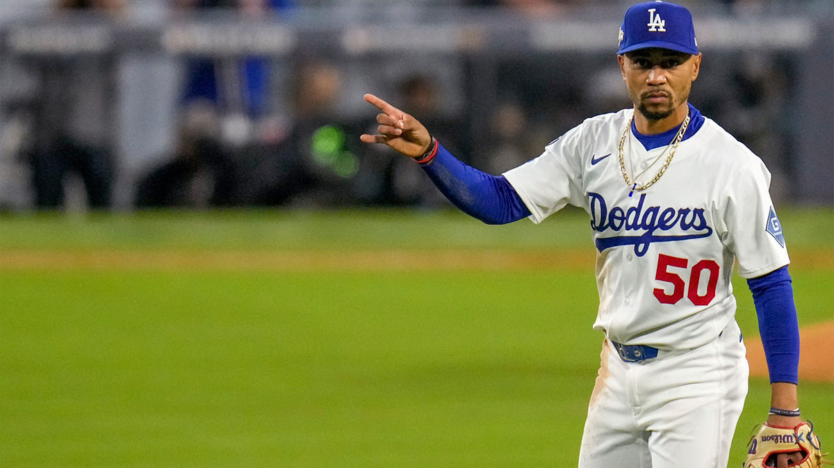 Dodgers star Mookie Betts drops a mic moment as Los Angeles warns playoff rivals with a dominant win over the Reds in the MLB Postseason.