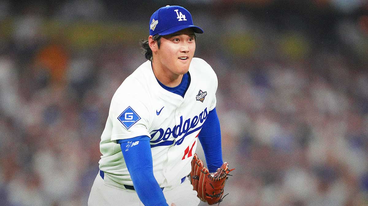Los Angeles Dodgers two-way player Shohei Ohtani (17) throws to first for an out against Toronto Blue Jays third baseman Addison Barger (47) in the sixth inning during game four of the 2025 MLB World Series at Dodger Stadium.