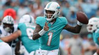 Miami Dolphins quarterback Tua Tagovailoa (1) throws a pass during the first quarter against the Carolina Panthers at Bank of America Stadium.