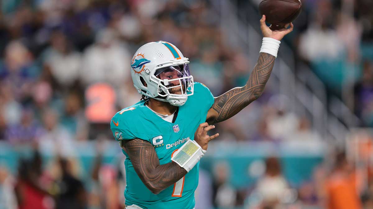 Miami Dolphins quarterback Tua Tagovailoa (1) throws downfield during the first quarter against the Baltimore Ravens at Hard Rock Stadium.