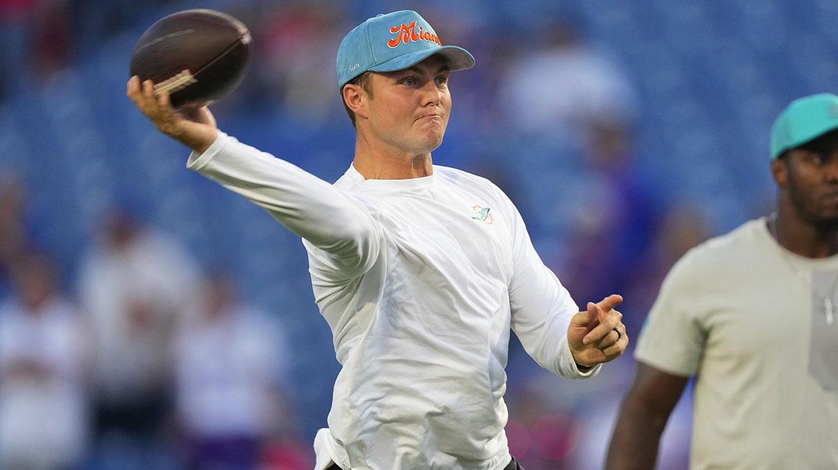 Miami Dolphins quarterback Zach Wilson (0) warms up before the game against the Buffalo Bills at Highmark Stadium.