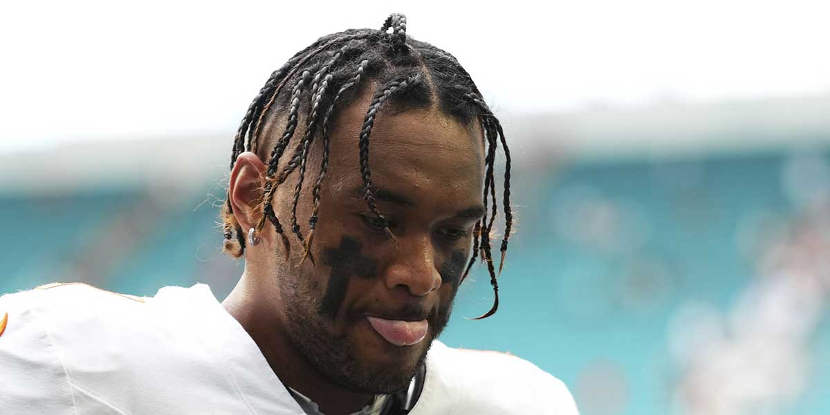 Dolphins quarterback Tua Tagovailoa (1) leaves the field at the end of a game against the Los Angeles Chargers at Hard Rock Stadium