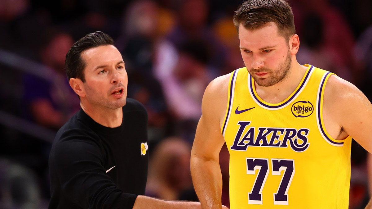 Los Angeles Lakers guard Luka Doncic (77) with head coach JJ Redick against the Phoenix Suns during an NBA preseason game at Mortgage Matchup Center.