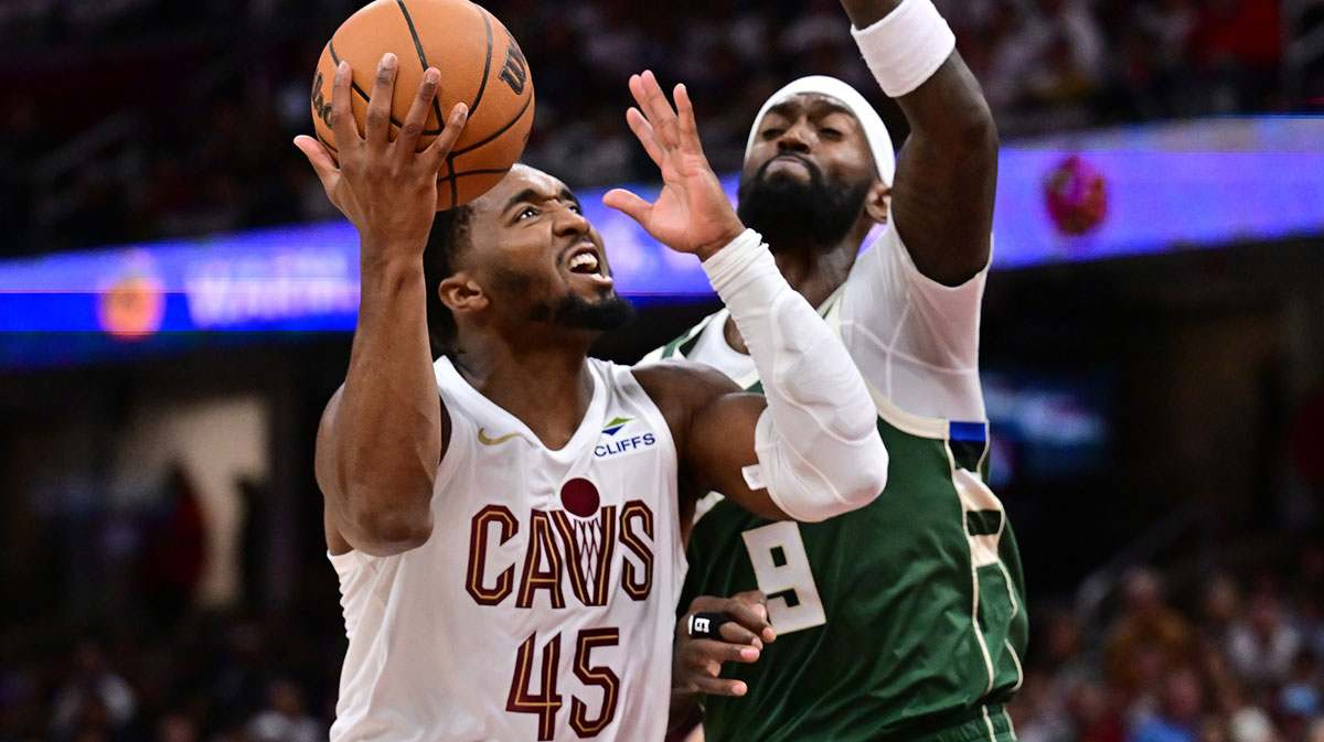 Cleveland Cavaliers guard Donovan Mitchell (45) drives to the basket against Milwaukee Bucks forward Bobby Portis (9) during the second half at Rocket Arena.