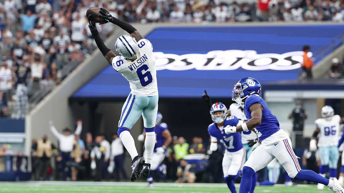 Dallas Cowboys safety Donovan Wilson (6) intercepts the ball against the New York Giants during overtime at AT&T Stadium. 