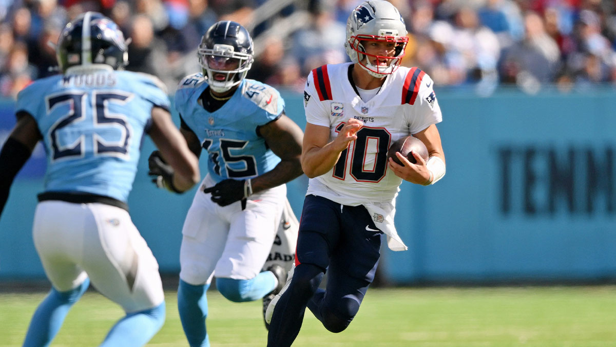 New England Patriots quarterback Drake Maye (10) runs with the ball against the Tennessee Titans during the second half at Nissan Stadium.