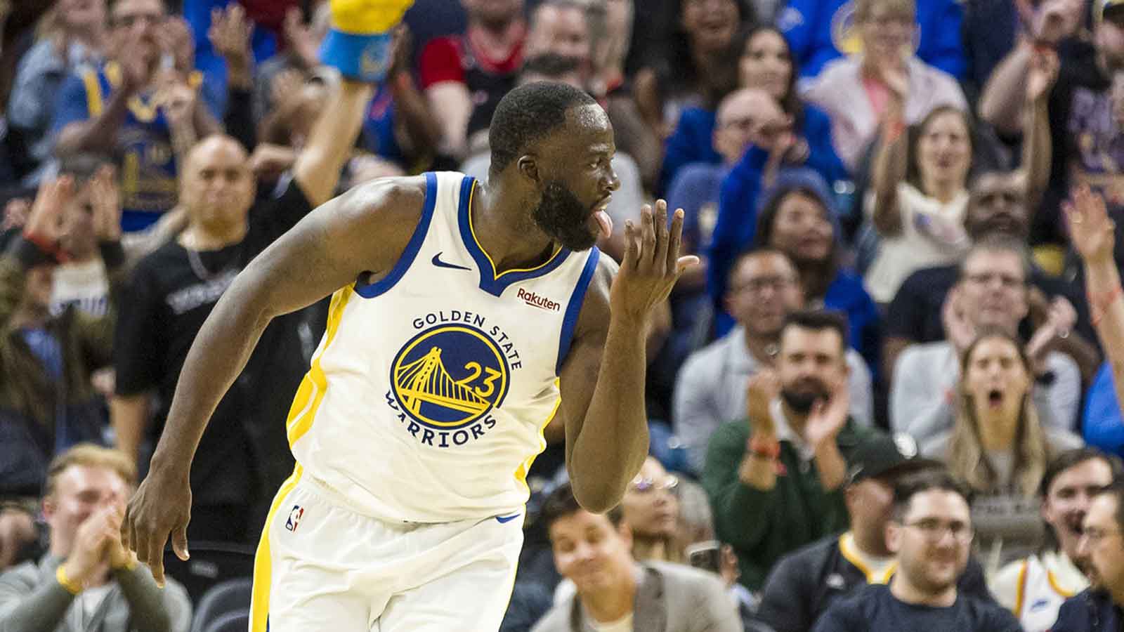 Golden State Warriors forward Draymond Green (23) reacts after scoring against the Portland Trail Blazers during the second quarter at Chase Center. 