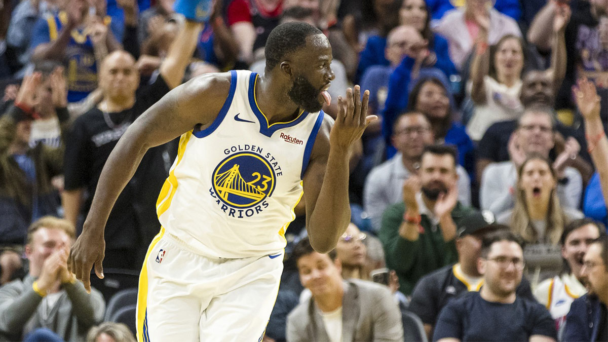 Golden State Warriors forward Draymond Green (23) reacts after scoring against the Portland Trail Blazers during the second quarter at Chase Center.