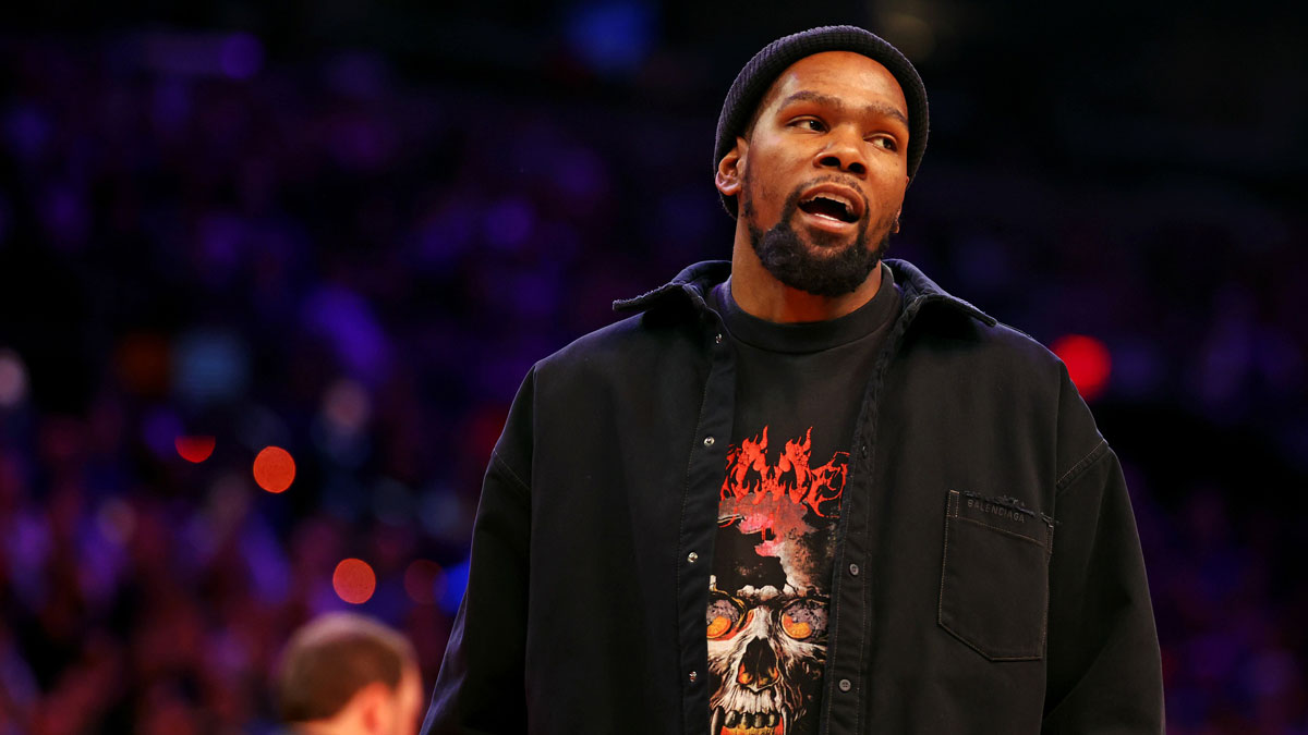 Phoenix Suns forward Kevin Durant looks on from the sidelines during the game between the Phoenix Suns and the New York Knicks at Footprint Center.