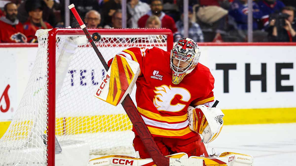 ; Calgary Flames goaltender Dustin Wolf (32) guards his net against the Montreal Canadiens during the third period at Scotiabank Saddledome