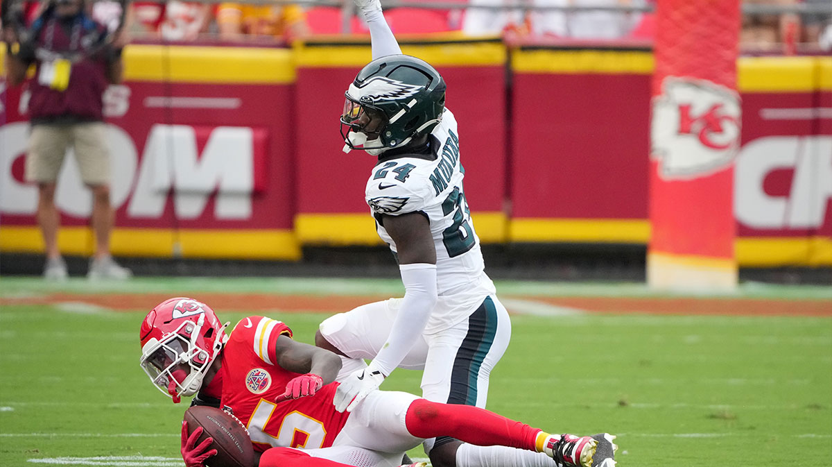 Philadelphia Eagles safety Andrew Mukuba (24) tackles Kansas City Chiefs wide receiver Hollywood Brown (5) during the third quarter of the game at GEHA Field at Arrowhead Stadium.