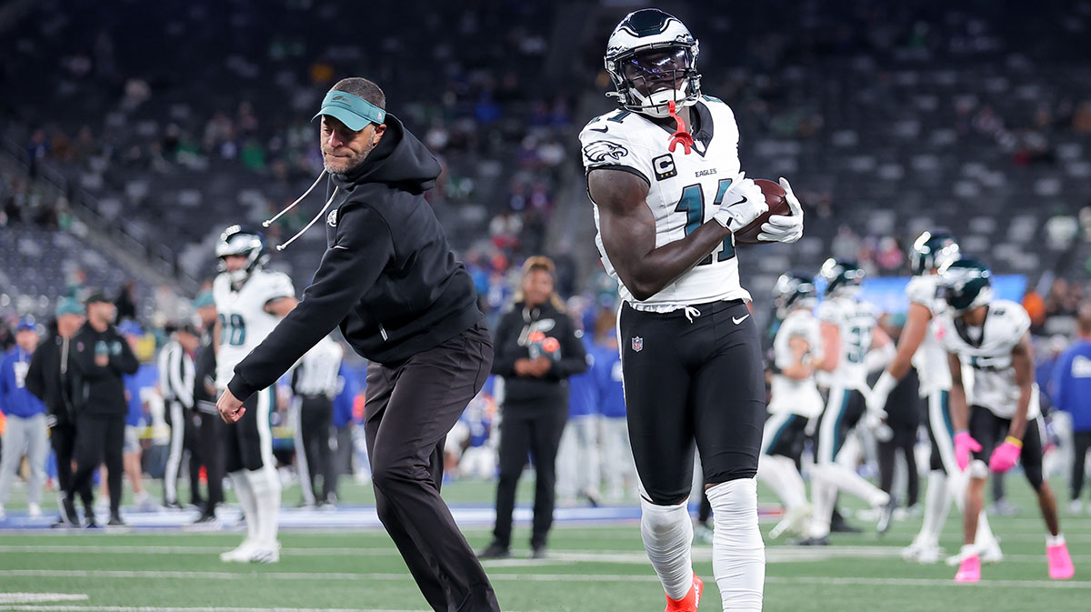 Philadelphia Eagles wide receiver A.J. Brown (11) warms up with wide recivers coach Aaron Moorehead prior to the game against the New York Giants at MetLife Stadium.