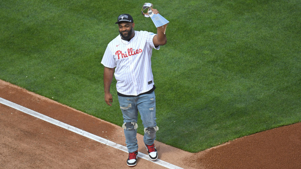 Philadelphia Eagles great Brandon Graham holds the Super Bowl trophy before throwing out the first pitch before game between Philadelphia Phillies and Colorado Rockies at Citizens Bank Park.