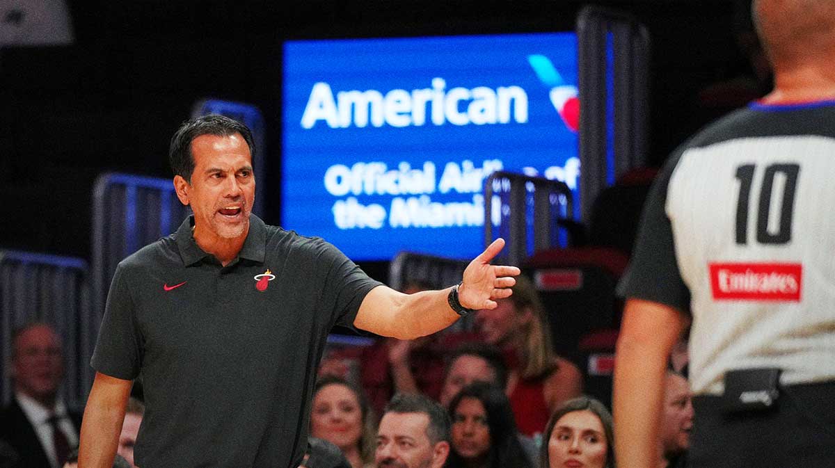 Miami Heat head coach Erik Spoelstra has a few words with the officials over a call during the first half of the game against the San Antonio Spurs at Kaseya Center.