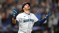 Seattle Mariners third baseman Eugenio Suarez (28) reacts after hitting a grand slam against the Toronto Blue Jays during the eighth inning during game five of the ALCS round for the 2025 MLB playoffs at T-Mobile Park.