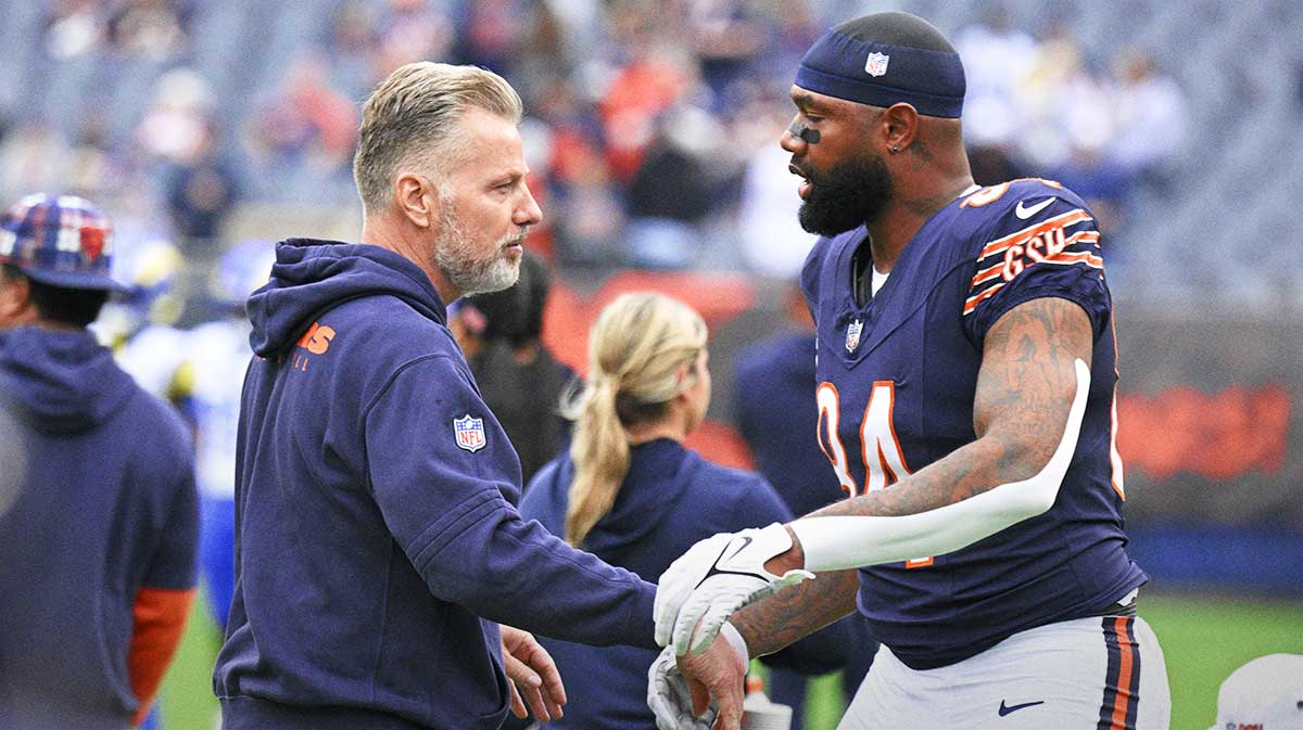 Chicago Bears head coach Matt Eberflus and Chicago Bears tight end Marcedes Lewis (84) before the game against the Los Angeles Rams at Soldier Field.