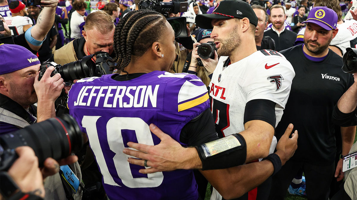 Minnesota Vikings wide receiver Justin Jefferson (18) and Atlanta Falcons quarterback Kirk Cousins (18) talk after the game at U.S. Bank Stadium.
