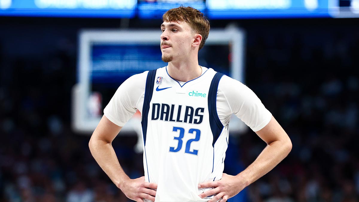 Dallas Mavericks forward Cooper Flagg (32) reacts against the San Antonio Spurs during the second half at American Airlines Center.