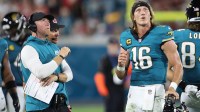 Jacksonville Jaguars head coach Liam Coen and quarterback Trevor Lawrence (16) during the first half against the Kansas City Chiefs at EverBank Stadium.