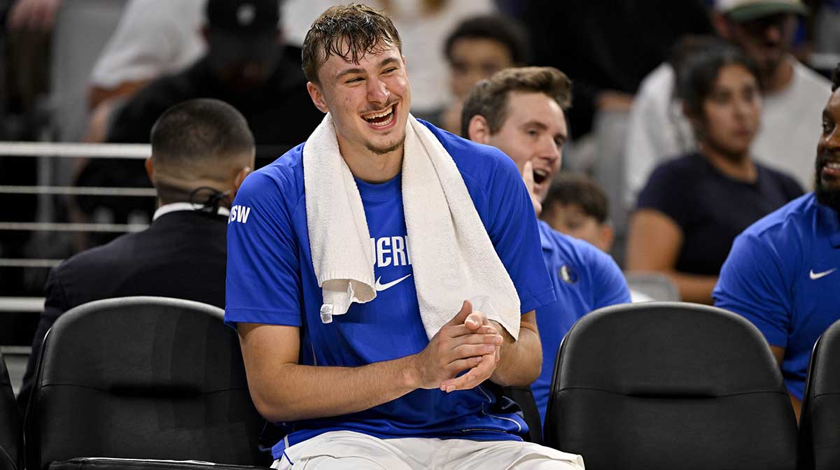 Dallas Mavericks forward Cooper Flagg (32) looks on from the team bench during the second half against the Oklahoma City Thunder at Dickie's Arena.