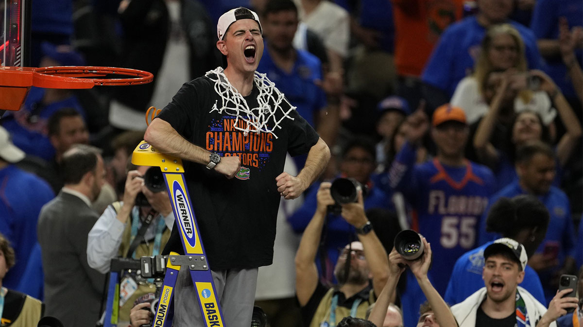 Florida Gators head coach Todd Golden reacts after cutting the net in the national championship game of the Final Four of the 2025 NCAA Tournament at the Alamodome.