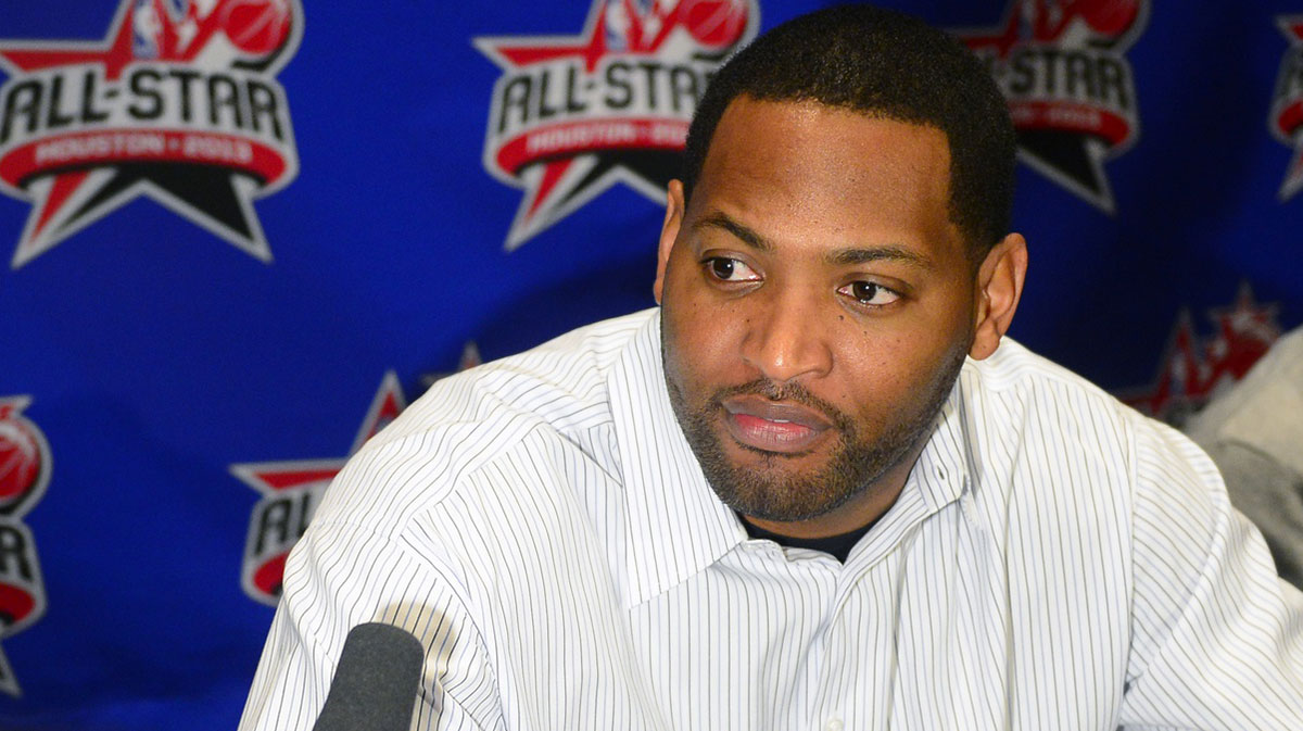 Robert Horry speaks to the media during the a press conference for the all star Saturday night participants at the Hilton Americas with Danny Ainge in the background