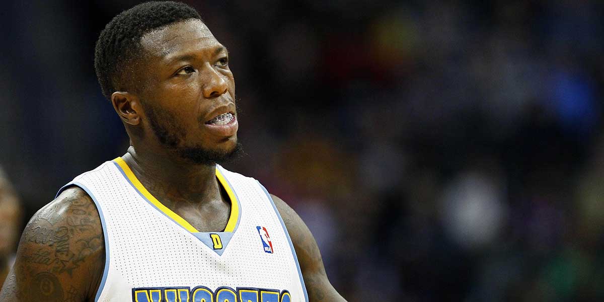 enver Nuggets point guard Nate Robinson (10) walks on the court in the third quarter against the New Orleans Pelicans at the Pepsi Center. The Nuggets won 102-93.