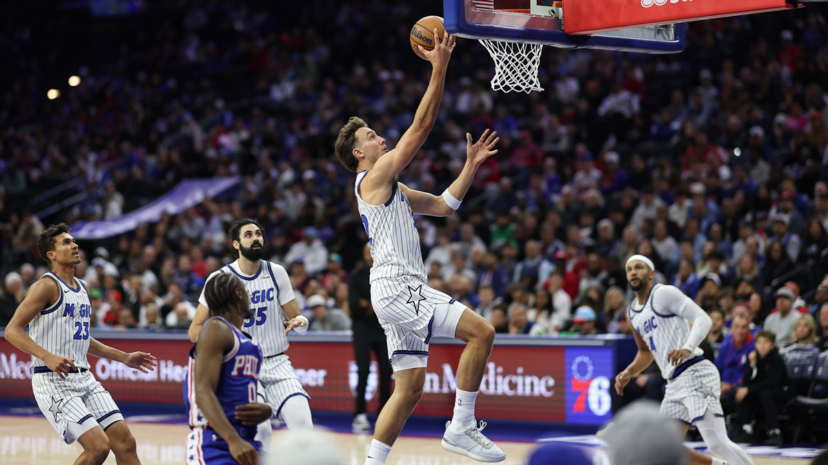 Orlando Magic forward Franz Wagner (22) drives for a score against the Philadelphia 76ers during the first quarter at Xfinity Mobile Arena.
