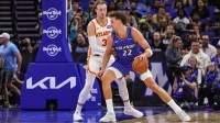 Orlando Magic forward Franz Wagner (22) drives to the basket around Atlanta Hawks guard Luke Kennard (3) during the second quarter at Kia Center.