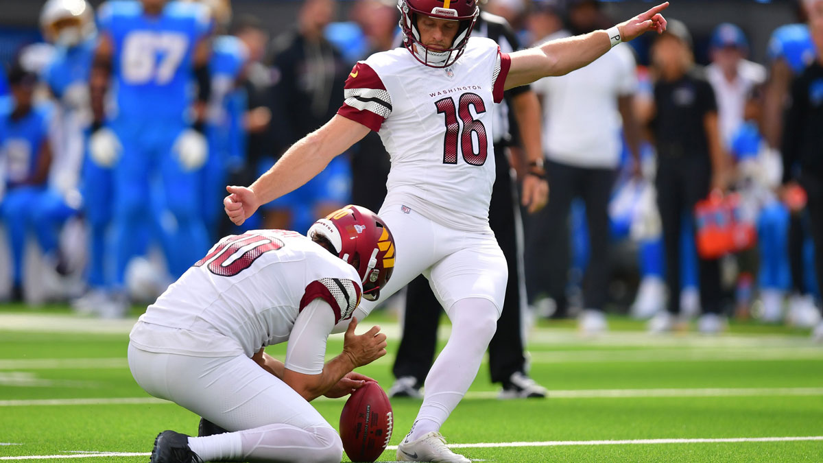 Washington Commanders kicker Matt Gay (16) kicks a field goal against the Los Angeles Chargers in the first half at SoFi Stadium.