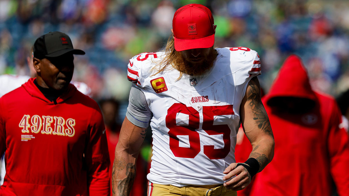 San Francisco 49ers tight end George Kittle (85) returns to the locker room for halftime against the Seattle Seahawks at Lumen Field.