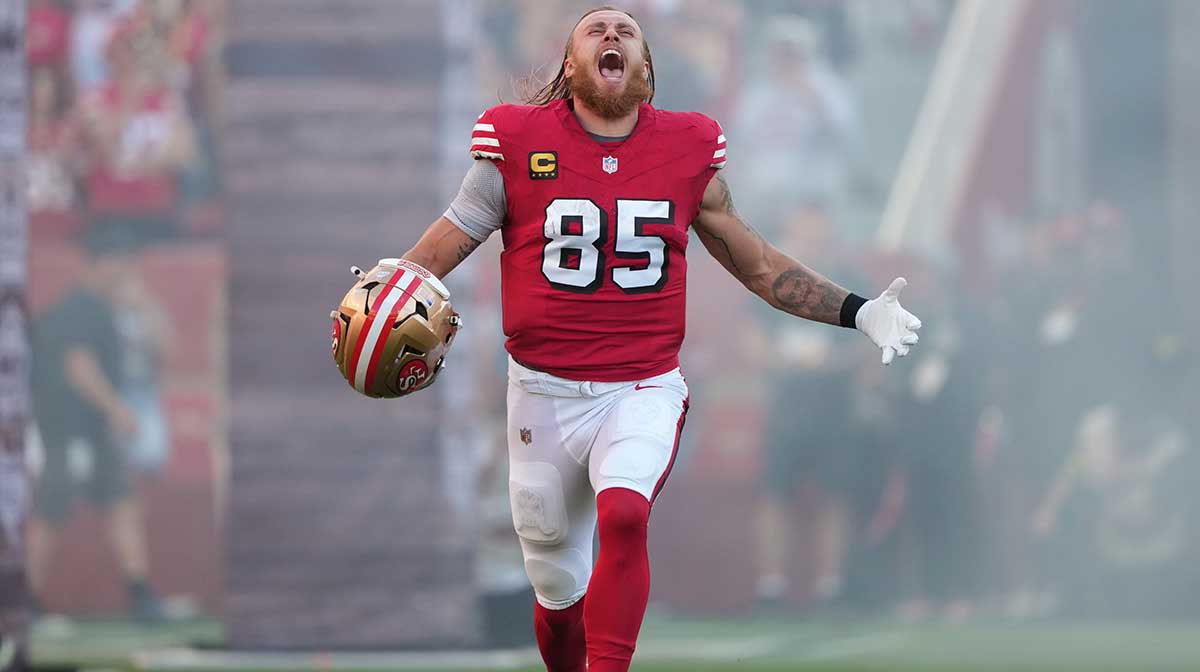 San Francisco 49ers tight end George Kittle (85) runs onto the field prior to the game against the Atlanta Falcons at Levi's Stadium.