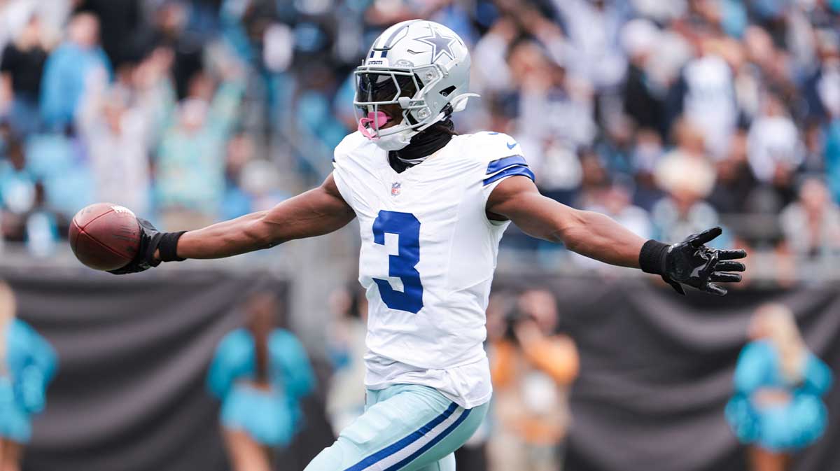 Dallas Cowboys wide receiver George Pickens (3) celebrates a touchdown during the second half against the Carolina Panthers at Bank of America Stadium.