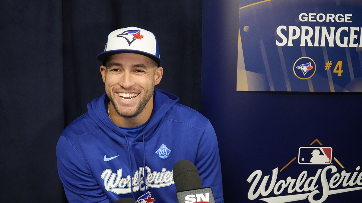 Toronto Blue Jays designated hitter George Springer (4) smiles after a question at the World Series media day interviews at Rogers Centre.