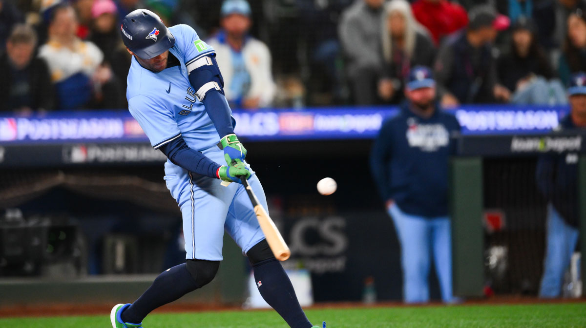 Toronto Blue Jays designated hitter George Springer (4) hits a single during the ninth inning against the Seattle Mariners during game three of the ALCS round for the 2025 MLB playoffs at T-Mobile Park.