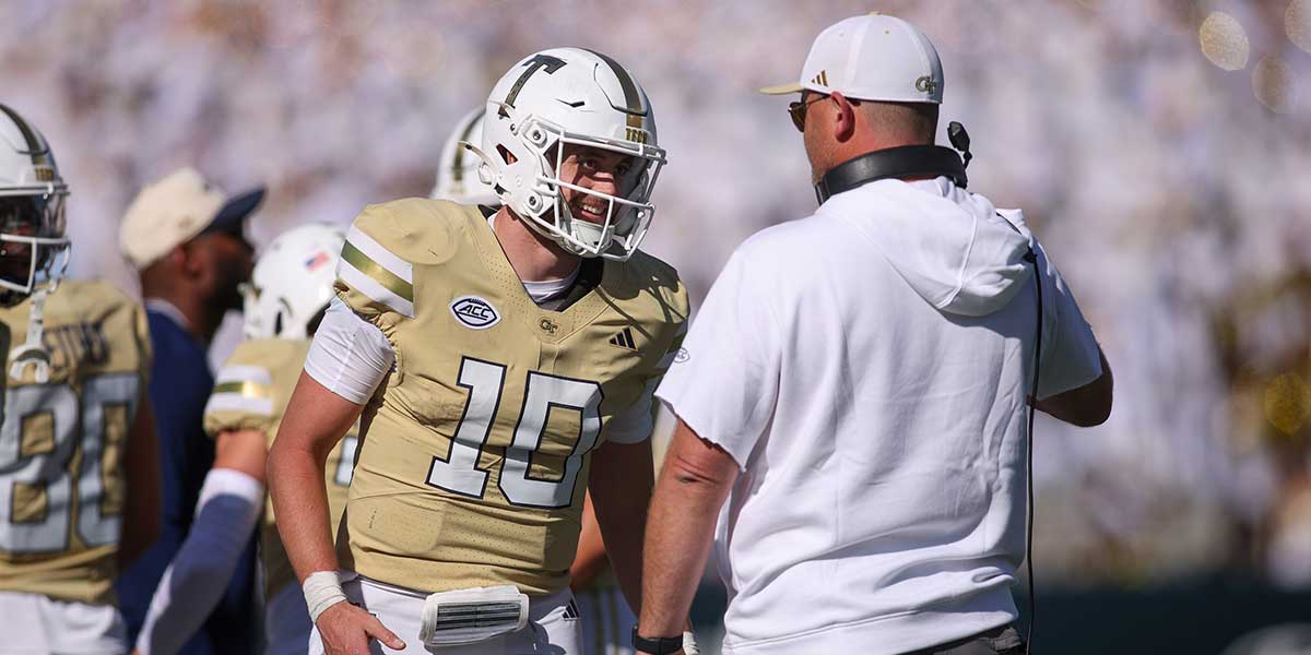 Georgia Tech Yellow Jackets quarterback Haynes King (10) and head coach Brent Key celebrate after at touchdown against the Syracuse Orange in the fourth quarter at Bobby Dodd Stadium at Hyundai Field.