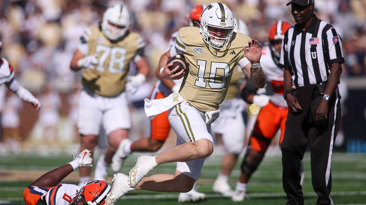 Georgia Tech Yellow Jackets quarterback Haynes King (10) runs the ball against the Syracuse Orange in the fourth quarter at Bobby Dodd Stadium at Hyundai Field.